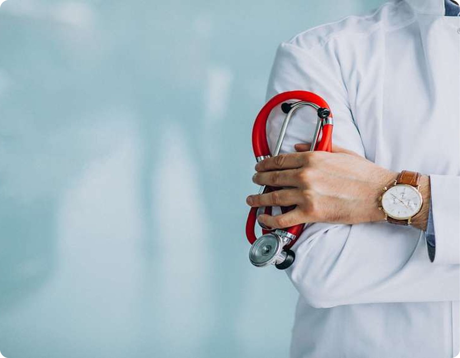 Doctor in white coat holding stethoscope